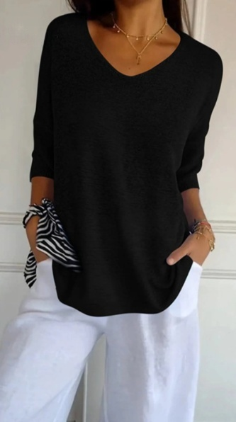 Hannah™ | Einfarbige Strickdamenbluse mit 3/4-Ärmeln und V-Ausschnitt.